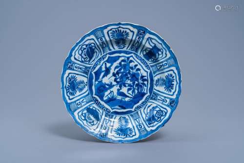 A CHINESE BLUE AND WHITE KRAAK PORCELAIN CHARGER WITH BIRDS ...