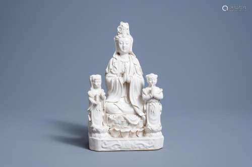 A CHINESE BLANC DE CHINE GROUP OF GUANYIN WITH SERVANTS, 20T...