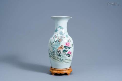 A CHINESE QIANJIANG CAI VASE WITH A QUAIL AMONG BLOSSOMING B...