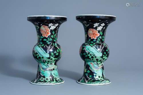 A PAIR OF CHINESE FAMILLE NOIRE VASES WITH PHEASANTS AND FLO...