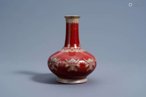 A CHINESE SANG DE BOEUF GLAZED VASE WITH ENAMELLED BATS AND ...