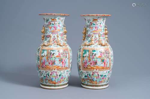 A PAIR OF CHINESE CANTON FAMILLE ROSE VASES WITH PALACE SCEN...