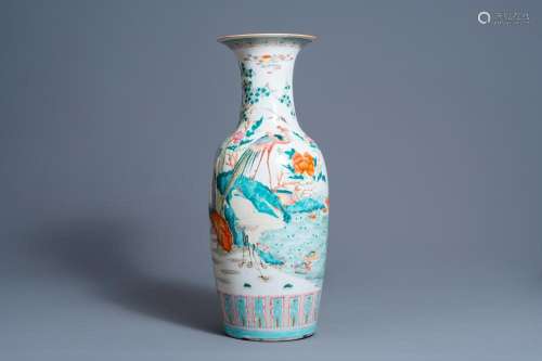 A CHINESE FAMILLE ROSE VASE WITH VARIOUS BIRDS IN A WATER LA...