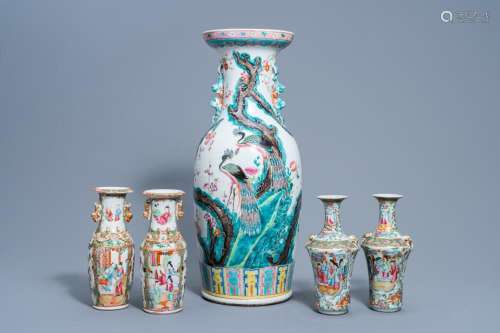 A CHINESE FAMILLE ROSE VASE WITH PEACOCKS AMONG BLOSSOMING B...