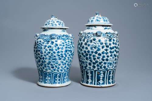 TWO CHINESE BLUE AND WHITE VASES AND COVERS WITH FLORAL DESI...