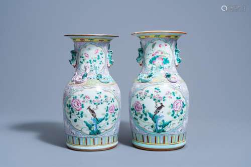 A PAIR OF CHINESE FAMILLE ROSE VASES WITH BIRDS AMONG BLOSSO...