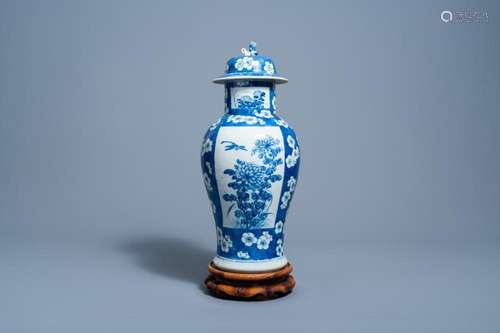 A CHINESE BLUE AND WHITE PRUNUS ON CRACKED ICE GROUND VASE A...