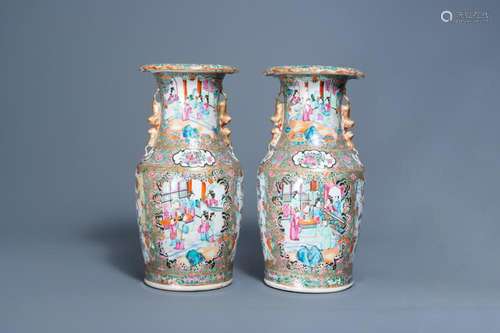 A PAIR OF CHINESE CANTON FAMILLE ROSE VASES WITH PALACE SCEN...