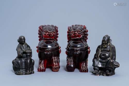 A PAIR OF CHINESE CHERRY RESIN BUDDHIST LIONS AND TWO CHINES...