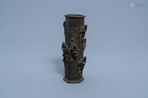 A CHINESE BRONZE VASE WITH RELIEF DESIGN OF IMMORTALS, MING