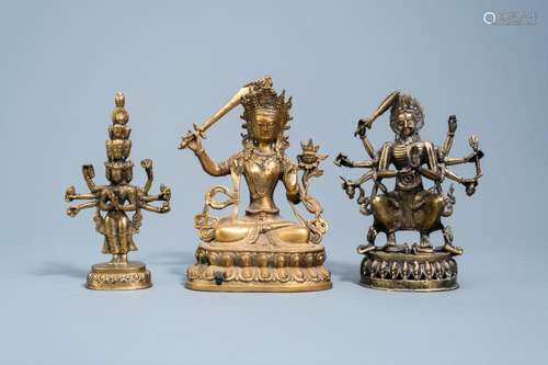 THREE SINO-TIBETAN BRONZE FIGURES OF DEITIES, 19TH/20TH C.