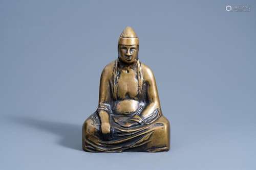 A TIBETAN BRONZE FIGURE OF A LAMA, 20TH C.