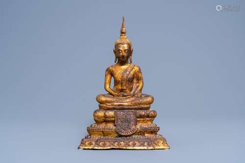 A THAI GILT BRONZE FIGURE OF BUDDHA MARAVIJAYA ON A LOTUS TH...