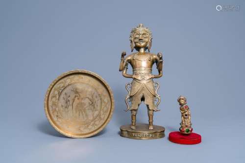 AN INDONESIAN BRASS ALLOY FIGURE OF A DEITY, AN EMBELLISHED ...