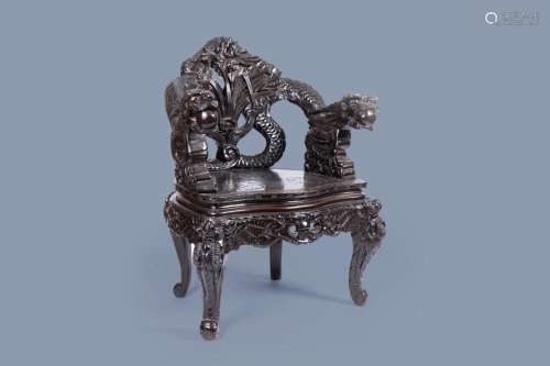 A JAPANESE CARVED WOOD 'DRAGONS AND IRISES' CHAIR, 1...