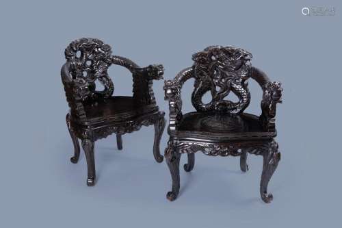 A PAIR OF JAPANESE CARVED WOOD 'DRAGON' CHAIRS, 19TH...