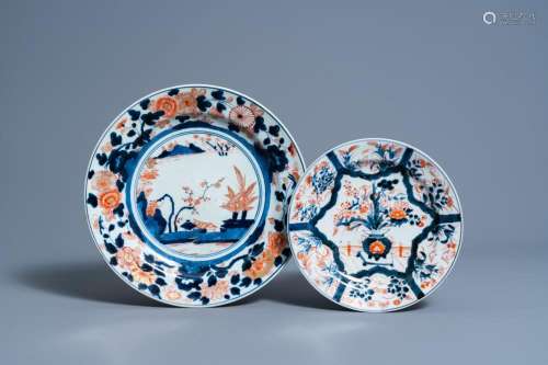 A JAPANESE IMARI CHARGER WITH A LANDSCAPE AND A PLATE WITH F...