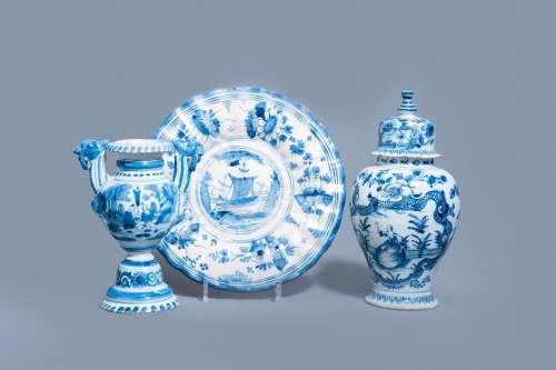 A DUTCH DELFT BLUE AND WHITE GADROONED DISH WITH A BOAT AND ...