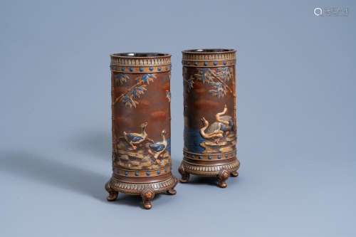 A PAIR OF METTLACH VASES WITH RELIEF DESIGN OF GEESE AND DUC...