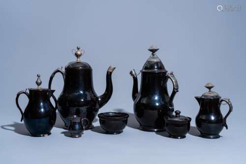 FIVE VARIOUS BLACK GLAZED NAMUR POTTERY JUGS AND TWO BOWLS, ...