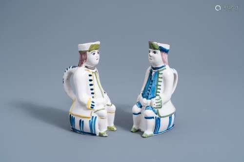 A PAIR OF  POLYCHROME FAIENCE FIGURATIVE 'JACQUOT' J...