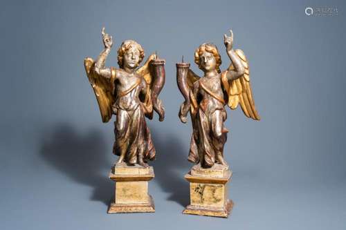 A PAIR OF ITALIAN CARVED, POLYCHROME PAINTED AND GILT WOODEN...