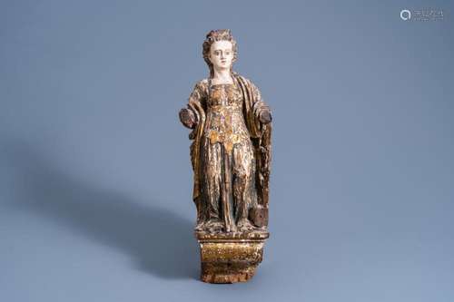 AN ITALIAN CARVED, POLYCHROME PAINTED AND GILT WOODEN FIGURE...