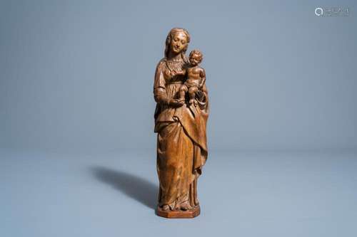 A FRENCH CARVED OAK WOOD VIRGIN AND CHILD, 17TH C.