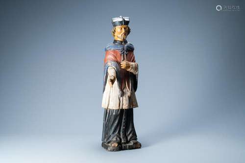 A CARVED AND POLYCHROME PAINTED WOODEN FIGURE OF SAINT JOHN ...