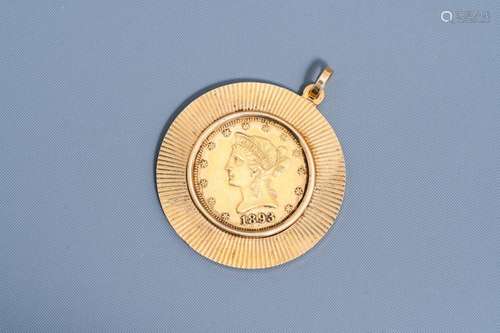 AN 18 CARAT YELLOW GOLD PENDANT SET WITH AN 1893 21,6 CARAT ...