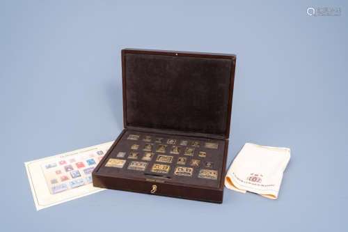 A COLLECTION OF 25 BELGIAN SILVER-GILT STAMPS WITH MATCHING ...