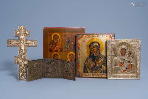 THREE RUSSIAN ICONS, ONE WITH OKLAD OR RIZA, A THREE-PIECE T...