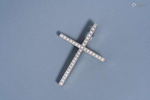 AN 18 CARAT WHITE GOLD CROSS-SHAPED PENDANT SET WITH 35 DIAM...