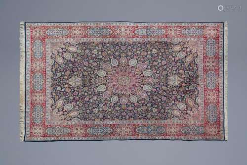 A FINE ORIENTAL RUG WITH FLORAL DESIGN, WOOL ON COTTON, KERM...