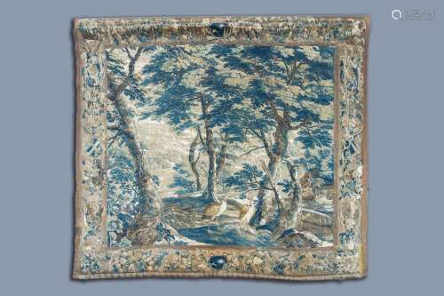 A FLEMISH WALL TAPESTRY WITH BIRDS IN A FOREST LANDSCAPE, SO...