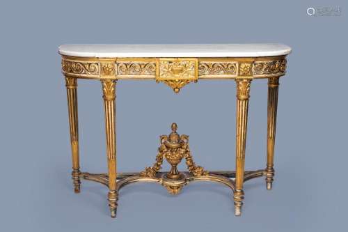 A LARGE FRENCH LOUIS XVI STYLE GILT AND PATINATED WOOD CONSO...
