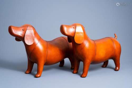 A PAIR OF LEATHER DOG OTTOMANS IN THE MANNER OF DIMITRI OMER...