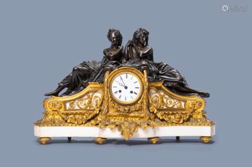 A FRENCH GILT AND PATINATED BRONZE AND WHITE MARBLE MANTEL C...