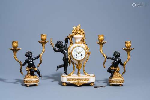 A FRENCH GILT AND PATINATED BRONZE MOUNTED WHITE MARBLE THRE...