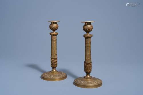 A PAIR OF FRENCH BRONZE CANDLESTICKS WITH FLORAL DESIGN, 19T...