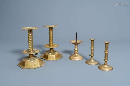ONE BRONZE AND TWO PAIRS OF BRASS CANDLESTICKS, WESTERN-EURO...