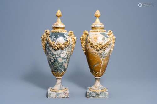 A PAIR OF GILT BRONZE MOUNTED MARBLE CASSOLETTES WITH SATYR ...