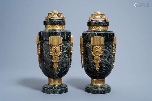 A PAIR OF ART DECO GILT BRONZE MOUNTED VERT DE MER MARBLE CA...