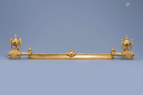 A PAIR OF FRENCH LOUIS XVI STYLE GILT BRONZE CHENETS AND FIR...