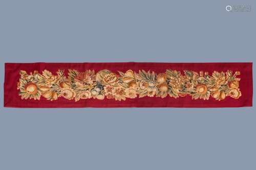 A HORIZONTAL EMBROIDERY WITH FRUITS AND FLOWERS, PROBABLY FL...