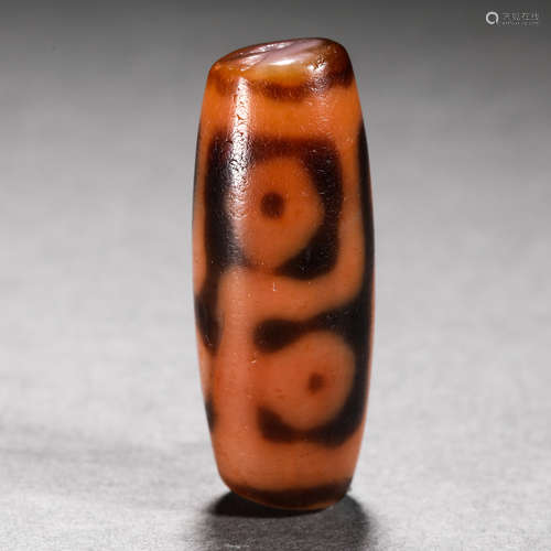 Tang Dynasty cinnabar six-eyed dzi bead