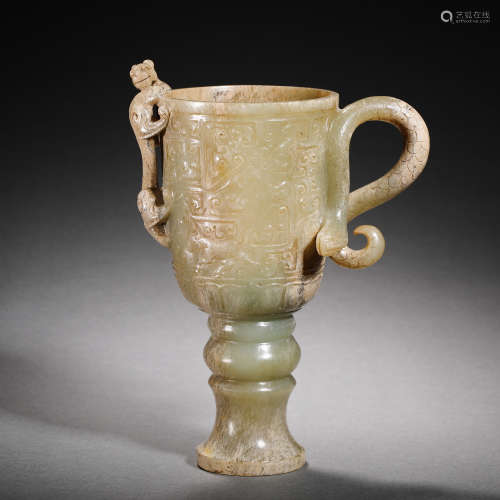 Han Dynasty Hetian jade cup with dragon pattern