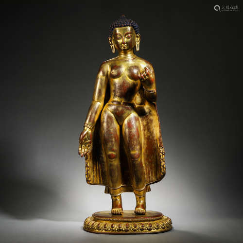 Standing gilt bronze statue of Sakyamuni Buddha in Ming Dyna...