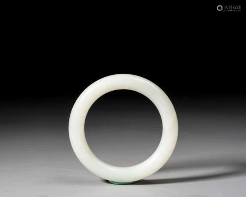 A WHITE JADE BANGLE