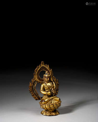 A GILT-BRONZE FIGURE OF BUDDHA